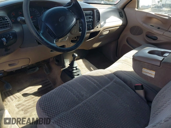 1997 Ford F-150 XL with VIN 1FTDX1861VNA66966, listed as a IAAI auction lot 40463926 with 302,389 mi miles and . Bid and sale history available at DreamBid. Image 13.