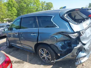 2019 Infiniti QX60 Luxe with VIN 5N1DL0MM7KC567051, listed as a IAAI auction lot 42065874 with 112,379 mi miles and . Bid and sale history available at DreamBid. Image 14.