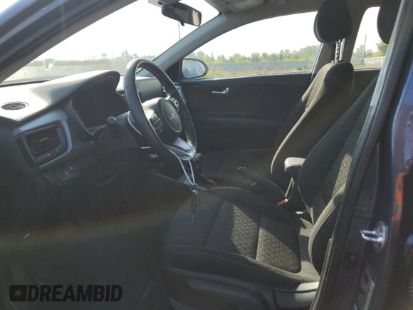 2023 Kia Rio S with VIN 3KPA25AD5PE548218, listed as a Copart auction lot 71808674 with 24,412 mi miles and Salvage Title. Bid and sale history available at DreamBid. Image 7.