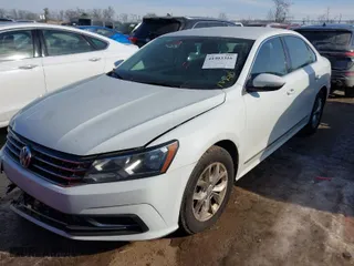 2016 Volkswagen Passat 1.8T S with VIN 1VWAS7A35GC015437, listed as a IAAI auction lot 41403316 with 167,873 mi miles. Bid and sale history available at carsss.com. Image 2.