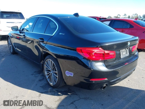 2019 BMW 5 Series 530e iPerformance with VIN WBAJA9C53KB388861, listed as a IAAI auction lot 41621712 with 68,128 mi miles. Bid and sale history available at carsss.com. Image 3.