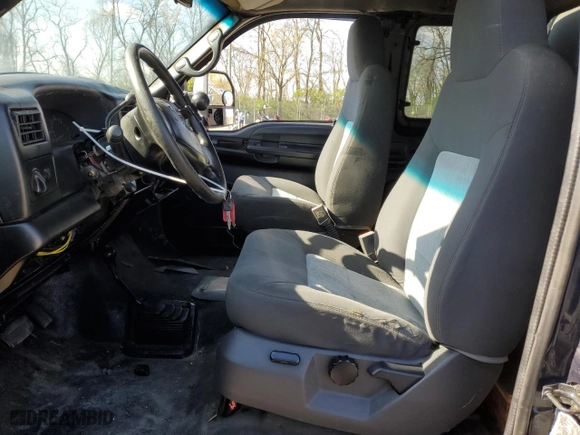 1999 Ford Super Duty F-250 XL with VIN 1FTNX21L5XEA67499, listed as a Copart auction lot 50822095 with 480,067 mi miles and Salvage Title. Bid and sale history available at carsss.com. Image 7.