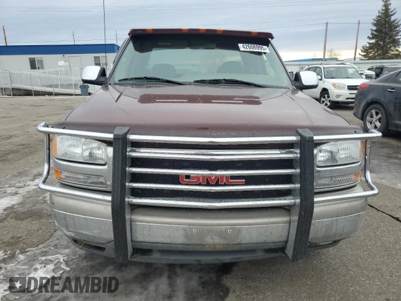 2000 GMC New Sierra 1500 SL with VIN 2GTEC19V1Y1185757, listed as a Copart auction lot 42606995 with 113,635 mi miles and Salvage Title. Bid and sale history available at carsss.com. Image 5.