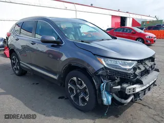 2017 Honda CR-V Touring with VIN 2HKRW2H95HH646184, listed as a IAAI auction lot 41906341 with 58,529 mi miles. Bid and sale history available at carsss.com. Image 1.