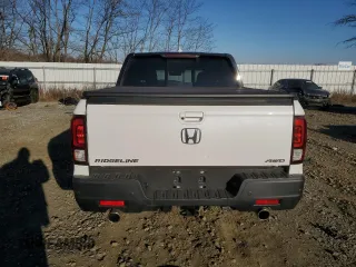 2023 Honda Ridgeline Black Edition with VIN 5FPYK3F82PB055208, listed as a Copart auction lot 87029914 with 33,687 mi miles and Salvage title. Bid and sale history available at DreamBid. Image 6.