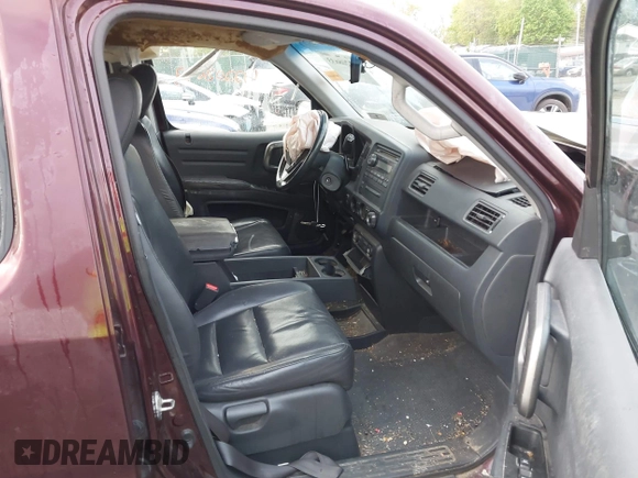 2010 Honda Ridgeline RTL with VIN 5FPYK1F57AB005602, listed as a IAAI auction lot 42208633 with 106,777 mi miles and . Bid and sale history available at DreamBid. Image 5.