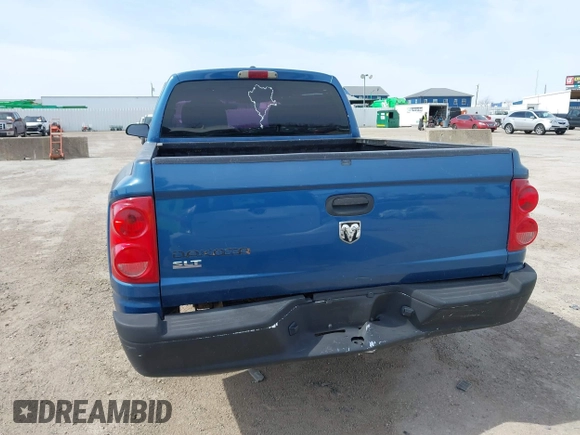 2006 Dodge Dakota SLT with VIN 1D7HE48K96S556831, listed as a IAAI auction lot 41681544 with 236,486 mi miles. Bid and sale history available at carsss.com. Image 6.