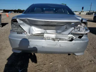 2005 Honda Civic Cpe LX with VIN 1HGEM22585L020146, listed as a Copart auction lot 54014185 with 189,567 mi miles and Salvage Title. Bid and sale history available at carsss.com. Image 6.