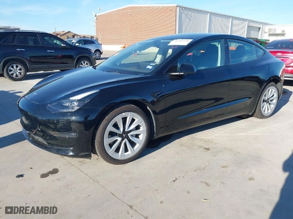 2023 Tesla Model 3 with VIN 5YJ3E1EA4PF552103, listed as a IAAI auction lot 40782218 with 20,997 mi miles. Bid and sale history available at carsss.com. Image 2.