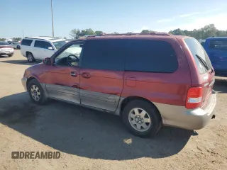 2003 Kia Sedona LX with VIN KNDUP131236411909, listed as a Copart auction lot 73715384 with 179,642 mi miles and Salvage Title. Bid and sale history available at carsss.com. Image 2.