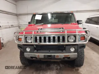 2004 Hummer H2 with VIN 5GRGN23U24H114730, listed as a IAAI auction lot 41605451 with 122,658 mi miles. Bid and sale history available at carsss.com. Image 12.