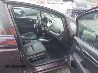 2015 Honda Fit EX-L z VIN 3HGGK5H81FM757562, wystawiony jako IAAI lot #42177050 z przebiegiem 217 618 mil mil oraz . Historia ofert i sprzedaży dostępna na DreamBid. Obrazek 5.