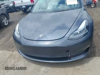2023 Tesla Model 3 with VIN 5YJ3E1EAXPF628911, listed as a IAAI auction lot 42362410 with 25,387 mi miles and . Bid and sale history available at DreamBid. Image 13.