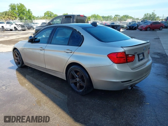 2015 BMW 3 Series 320i with VIN WBA3B1G58FNT03373, listed as a IAAI auction lot 41843859 with 98,439 mi miles. Bid and sale history available at carsss.com. Image 3.