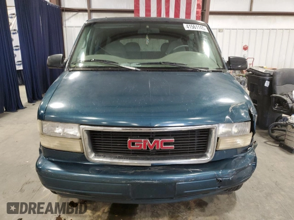 2000 GMC Safari z VIN 1GKDM19W3YB542183, wystawiony jako Copart lot #41561145 z przebiegiem 328 252 mil mil oraz Szkody całkowita. Historia ofert i sprzedaży dostępna na DreamBid. Obrazek 5.