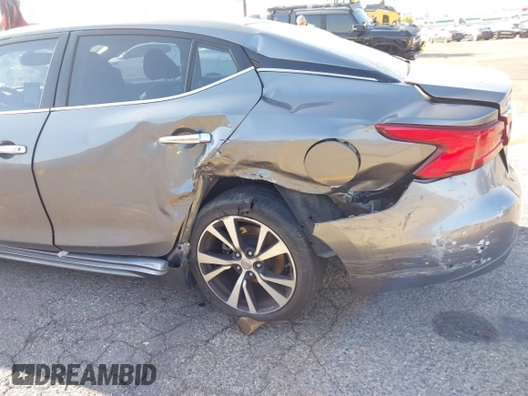 2018 Nissan Maxima SL with VIN 1N4AA6AP1JC400557, listed as a IAAI auction lot 42094626 with 96,764 mi miles and . Bid and sale history available at DreamBid. Image 6.