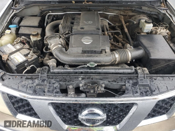 2006 Nissan Frontier SE z VIN 1N6AD06U16C416677, wystawiony jako Copart lot #47777995 z przebiegiem 173 997 mil mil oraz Szkoda całkowita • Salvage title. Historia ofert i sprzedaży dostępna na DreamBid. Obrazek 13.
