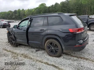 2023 Volkswagen Atlas SEL R-Line Black z VIN 1V2SR2CA1PC552029, wystawiony jako Copart lot #54371935 z przebiegiem Nie podano mil oraz Szkoda całkowita • Salvage title. Historia ofert i sprzedaży dostępna na DreamBid. Obrazek 2.