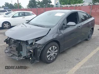 2021 Toyota Prius LE with VIN JTDKAMFP4M3194053, listed as a IAAI auction lot 42441091 with 47,290 mi miles and . Bid and sale history available at DreamBid. Image 21.