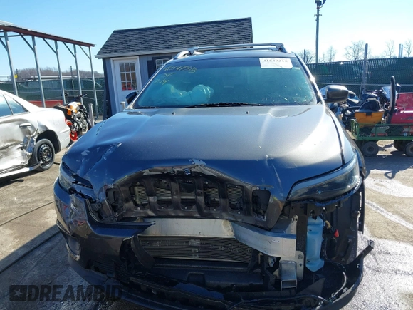 2019 Jeep Cherokee Altitude with VIN 1C4PJMLN7KD194094, listed as a IAAI auction lot 41547315 with 74,123 mi miles. Bid and sale history available at carsss.com. Image 12.