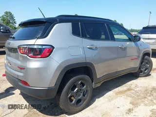 2023 Jeep Compass Trailhawk with VIN 3C4NJDDN3PT527995, listed as a IAAI auction lot 42218464 with 47,701 mi miles and . Bid and sale history available at carsss.com. Image 4.