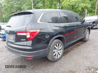 2022 Honda Pilot EX-L with VIN 5FNYF6H58NB018372, listed as a IAAI auction lot 42327580 with 79,332 mi miles and . Bid and sale history available at DreamBid. Image 4.