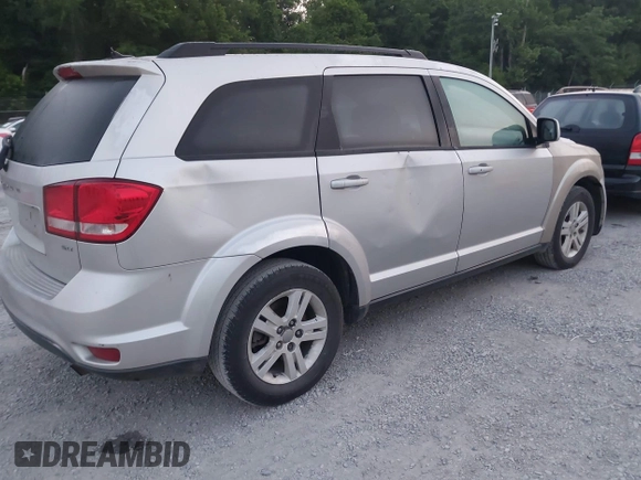 2012 Dodge Journey SXT with VIN 3C4PDCBBXCT323532, listed as a IAAI auction lot 42471610 with 188,103 mi miles and . Bid and sale history available at DreamBid. Image 4.