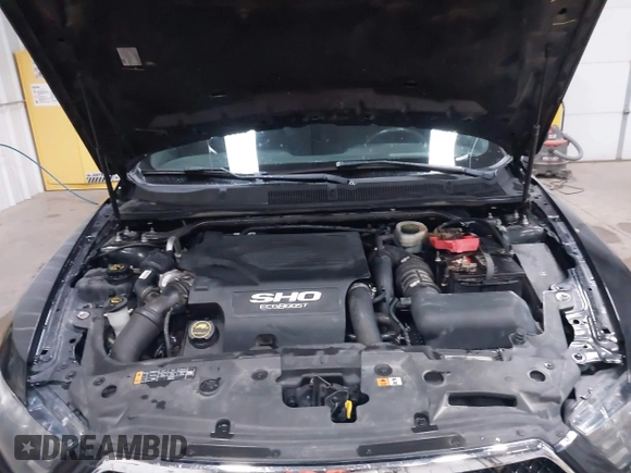 2015 Ford Taurus SHO with VIN 1FAHP2KT6FG137418, listed as a IAAI auction lot 42256452 with 140,335 mi miles and . Bid and sale history available at DreamBid. Image 10.