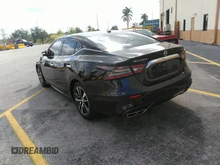 2021 Nissan Maxima SV with VIN 1N4AA6CV4MC506744, listed as a IAAI auction lot 42150465 with 70,056 mi miles and . Bid and sale history available at DreamBid. Image 3.