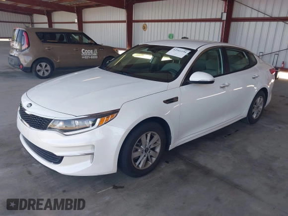2016 Kia Optima LX with VIN KNAGT4L34G5105864, listed as a IAAI auction lot 42161194 with 106,351 mi miles. Bid and sale history available at carsss.com. Image 2.