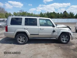 2007 Jeep Commander Sport z VIN 1J8HG48P17C695954, wystawiony jako IAAI lot #42106559 z przebiegiem Nie podano mil oraz . Historia ofert i sprzedaży dostępna na DreamBid. Obrazek 14.