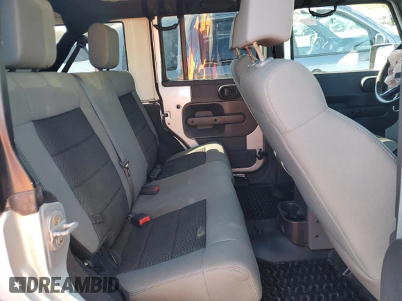 2009 Jeep Wrangler Unlimited X with VIN 1J4GA39179L756228, listed as a Copart auction lot 50086445 with 158,274 mi miles and Salvage Title. Bid and sale history available at carsss.com. Image 10.