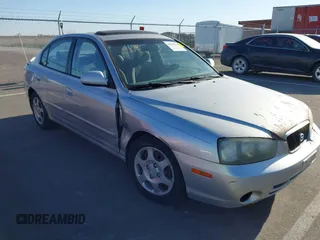 2003 Hyundai Elantra GLS z VIN KMHDN45D63U553542, wystawiony jako IAAI lot #42032294 z przebiegiem 164 210 mil mil oraz . Historia ofert i sprzedaży dostępna na DreamBid. Obrazek 1.