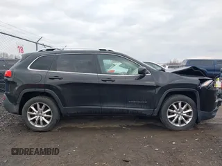 2014 Jeep Cherokee Limited with VIN 1C4PJMDB1EW156776, listed as a IAAI auction lot 41852167 with 130,514 mi miles and . Bid and sale history available at DreamBid. Image 14.