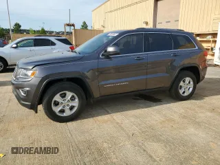 2016 Jeep Grand Cherokee Laredo z VIN 1C4RJEAG3GC313954, wystawiony jako Copart lot #54148175 z przebiegiem 86 017 mil mil oraz Czysty tytuł • Clean title. Historia ofert i sprzedaży dostępna na DreamBid. Obrazek 1.