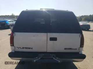 1996 GMC Yukon with VIN 1GKEK13R1TJ750705, listed as a Copart auction lot 76251474 with 245,084 mi miles and Salvage Title. Bid and sale history available at carsss.com. Image 6.