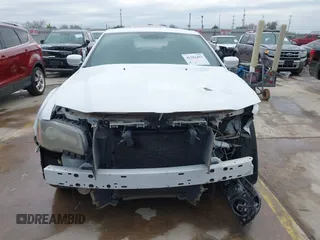 2013 Chrysler 300 with VIN 2C3CCABGXDH735739, listed as a IAAI auction lot 41282492 with 121,487 mi miles. Bid and sale history available at carsss.com. Image 13.