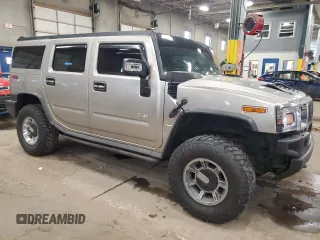 2005 Hummer H2 SUV with VIN 5GRGN23U05H103176, listed as a Copart auction lot 44365545 with 165,887 mi miles and Salvage Title. Bid and sale history available at carsss.com. Image 4.