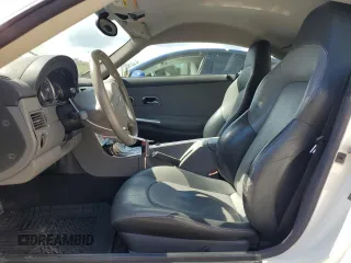 2004 Chrysler Crossfire with VIN 1C3AN69L04X024094, listed as a Copart auction lot 47047425 with 210,638 mi miles and Salvage title. Bid and sale history available at DreamBid. Image 7.