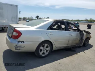 2004 Toyota Camry LE z VIN JTDBE32K740250691, wystawiony jako Copart lot #55793225 z przebiegiem Nie podano mil oraz Szkoda całkowita • Salvage title. Historia ofert i sprzedaży dostępna na DreamBid. Obrazek 3.