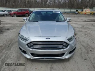 2016 Ford Fusion Titanium with VIN 3FA6P0K99GR319253, listed as a Copart auction lot 51935965 with 186,717 mi miles and Salvage Title. Bid and sale history available at DreamBid. Image 5.