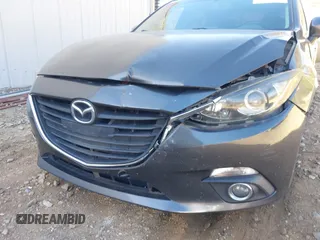 2014 Mazda 3 i Grand Touring with VIN JM1BM1M77E1119529, listed as a IAAI auction lot 41399739 with 126,931 mi miles and . Bid and sale history available at DreamBid. Image 12.
