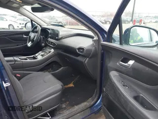 2023 Hyundai Santa Fe SE z VIN 5NMS1DAJ2PH555126, wystawiony jako IAAI lot #41992424 z przebiegiem 34 263 mil mil oraz . Historia ofert i sprzedaży dostępna na DreamBid. Obrazek 5.