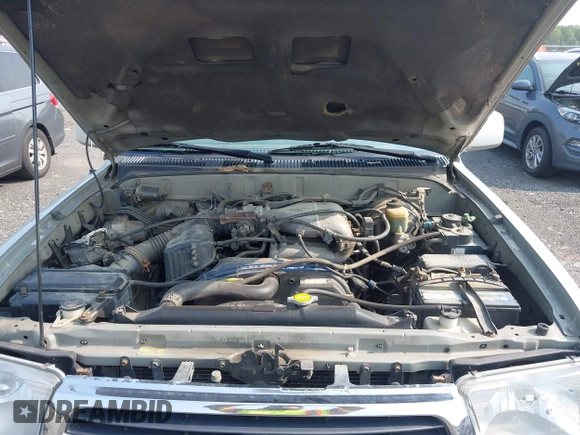 2000 Toyota 4Runner SR5 z VIN JT3HN86R7Y0290729, wystawiony jako IAAI lot #42409622 z przebiegiem 315 804 mil mil oraz . Historia ofert i sprzedaży dostępna na DreamBid. Obrazek 10.