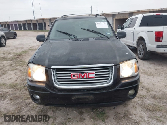 2006 GMC Envoy SLT with VIN 1GKDS13S462241866, listed as a IAAI auction lot 41943322 with 90,695 mi miles. Bid and sale history available at carsss.com. Image 6.