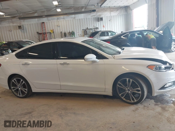 2017 Ford Fusion Titanium with VIN 3FA6P0D9XHR136815, listed as a IAAI auction lot 42596651 with 109,608 mi miles and . Bid and sale history available at DreamBid. Image 13.