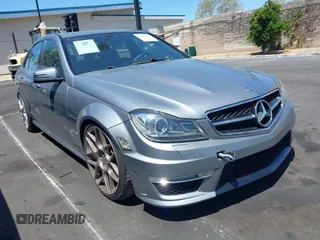 2012 Mercedes-Benz C C 63 AMG with VIN WDDGF7HB2CA733599, listed as a IAAI auction lot 42094388 with 81,287 mi miles. Bid and sale history available at carsss.com. Image 1.