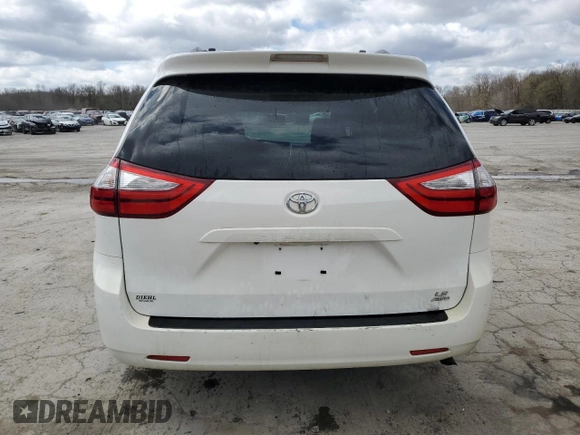 2016 Toyota Sienna LE with VIN 5TDJK3DC3GS131175, listed as a Copart auction lot 52520595 with 107,001 mi miles and Salvage Title. Bid and sale history available at carsss.com. Image 6.
