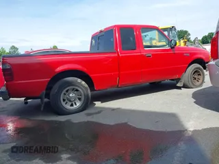 2001 Ford Ranger XLT Appearance z VIN 1FTYR14E11TA28698, wystawiony jako IAAI lot #42154749 z przebiegiem 330 313 mil mil oraz . Historia ofert i sprzedaży dostępna na DreamBid. Obrazek 4.