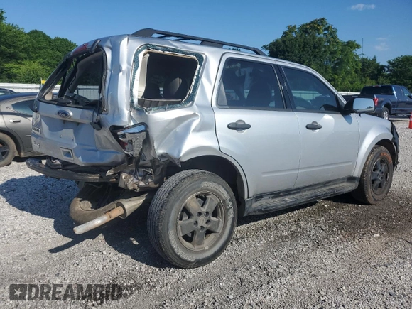 2010 Ford Escape XLS with VIN 1FMCU0C73AKA52802, listed as a Copart auction lot 60100185 with 141,541 mi miles and Clean title. Bid and sale history available at DreamBid. Image 3.